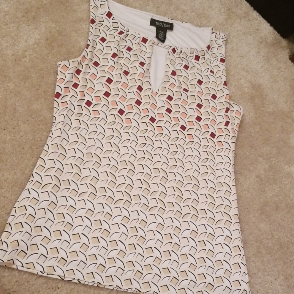 Sleeveless pink/cream blouse